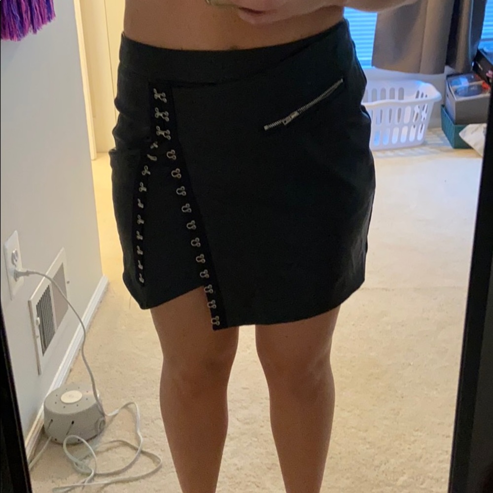 Black asymmetrical skirt with hook detail